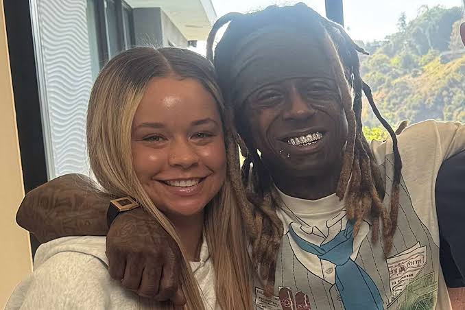 Man and woman smiling together in a close up photo