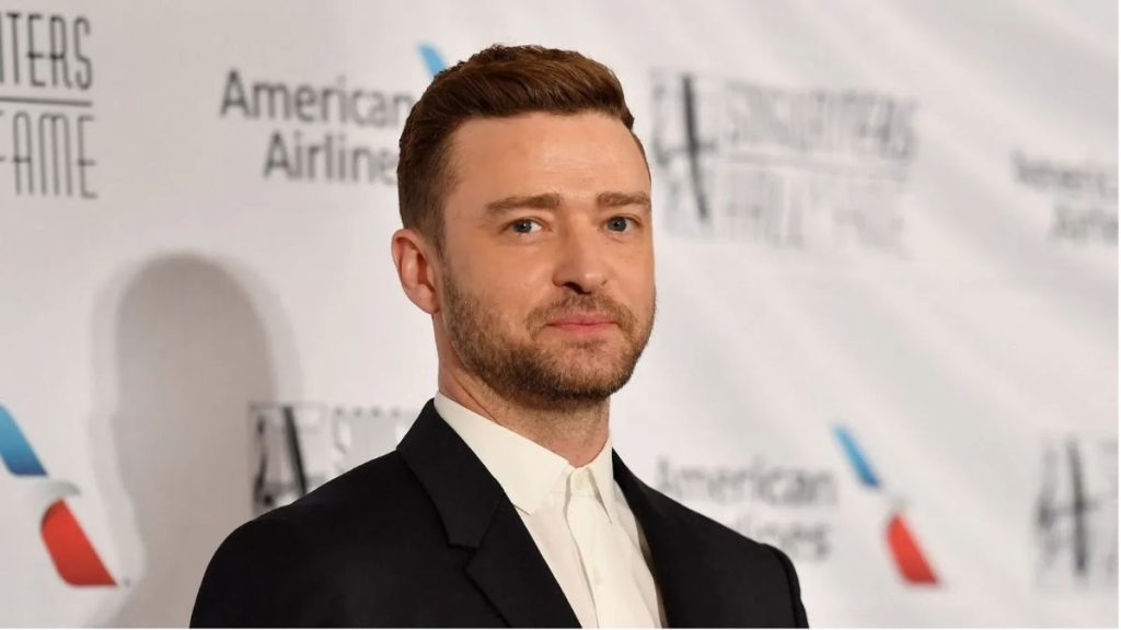 Justin Timberlake attending a public event in a black suit