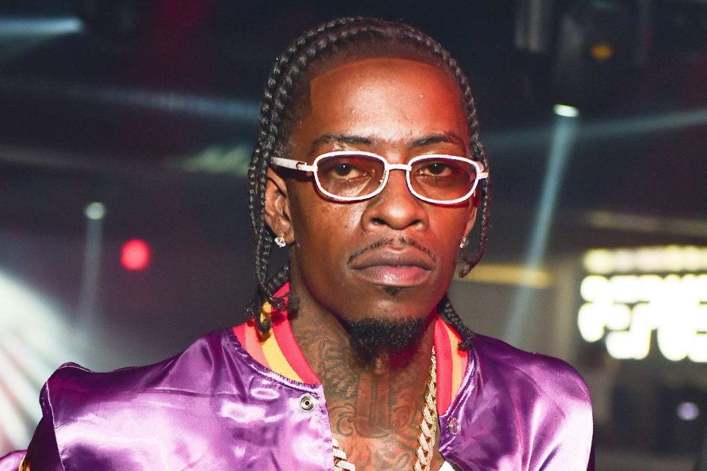 Rich Homie Quan wearing glasses during a public appearance
