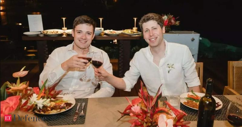 Two men sitting together at a table during a casual outing